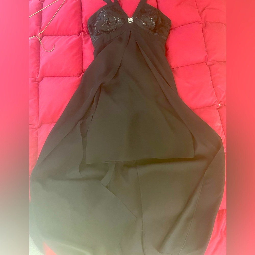 Beautiful gown -short skirt style with flattering black sheer flowing overlay.